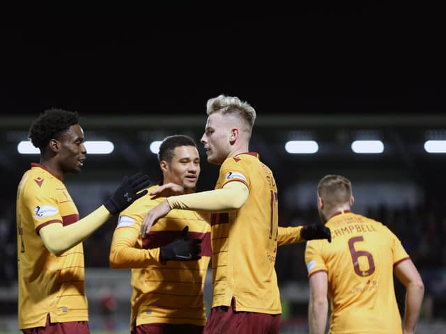 James Scott celebrates scoring at St Mirren on December 4 last year with jubilant team-mates Devante Cole and jermaine Hylton (Pic by Ian McFadyen)