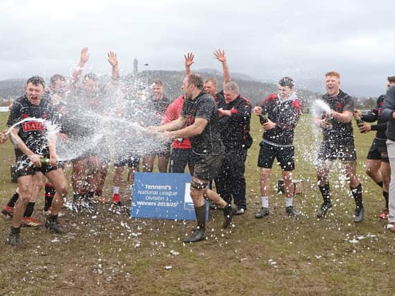 Biggar Rugby Club are pictured celebrating winning this seasons Tennents National Division 1  (Pic by Nigel Pacey)