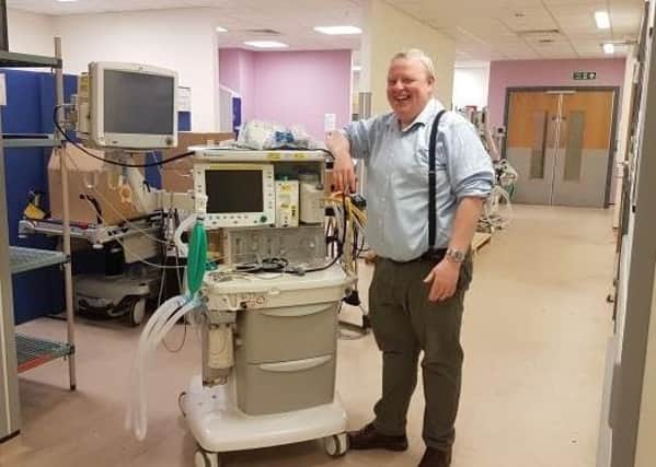 Mark Prentice, Clinical Services Team, with an anaesthetic machine.