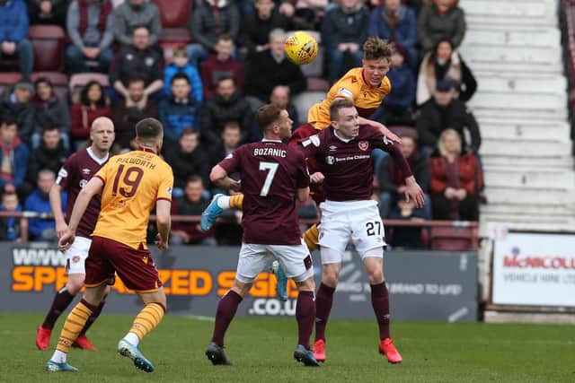 Mark OHara wins a header during Wells last game, a 1-1 draw at Hearts on March 7 (Pic by Ian McFadyen)
