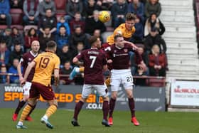 Mark OHara wins a header during Wells last game, a 1-1 draw at Hearts on March 7 (Pic by Ian McFadyen)