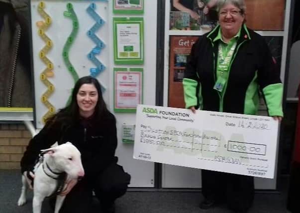 The charity received £1,000 from the Govan ASDA store. (Photo: Scottish SPCA).