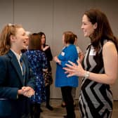 Jessica speaking with Jennifer Reoch at International Women's Day event.