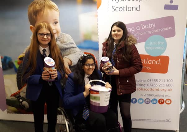 Emma Keenan, Lisa Scott and Shafa Waqas visited SBH Scotland to hand over their donation