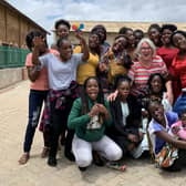 Building a better future...most of the young mums are still children themselves so the Guild members, including Karen Gillon pictured here with the girls, enjoyed seeing them relax and have some fun too.