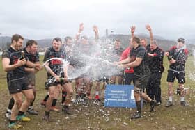 Biggar players celebrate winning this season's National League Division 1