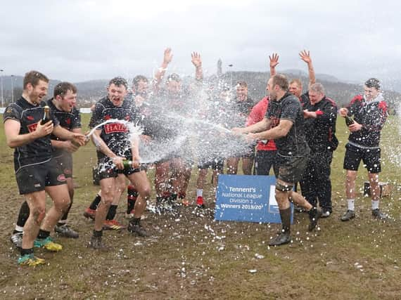 Biggar players celebrate winning this season's National League Division 1