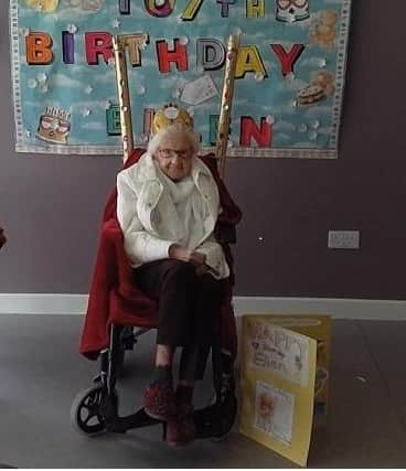 Ellen is pictured with one of the birthday banners made by children of key workers attending Toryglen Primary School hub.