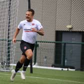 Ally Love celebrates after scoring for Clyde from the penalty spot against Annan to clinch promotion