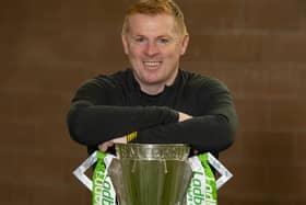 Neil Lennon with the Ladbrokes Premiership trophy at Lennoxtown.