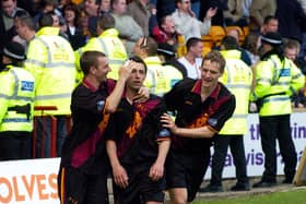 Willie Kinniburgh (right) and Shaun Fagan hail goal hero Scott McDonald (Pic by Alan Watson)