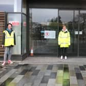 Zoe Jamieson, Rebecca Hickey and Emma Barbour working as wardens at their local covid centre