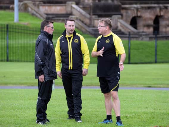 Robert Sneddon (centre) has left Bellshill Athletic after five years as manager