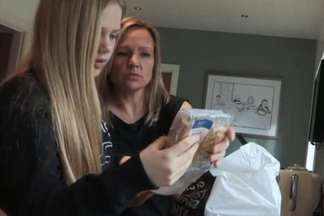 Martha McMahon and her mum Paula carefully check food labels.