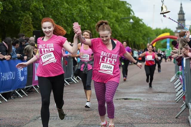 Race for Life finishers at Glasgow Green last May.