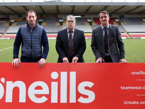 Left to right are O'Neills Irish International Sportswear sales manager Paul Berry and Thistle manager Ian McCall and chief executive Gerry Britton