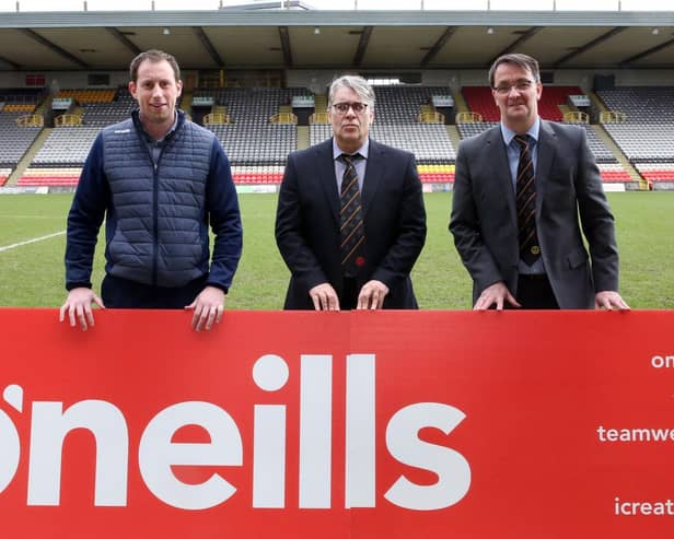Left to right are O'Neills Irish International Sportswear sales manager Paul Berry and Thistle manager Ian McCall and chief executive Gerry Britton