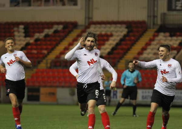 Ray Grant celebrates after netting Clyde's winner against Montrose