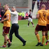 Robinson and Campbell celebrate a 3-2 win at Hearts last season. (Pic by Ian McFadyen)