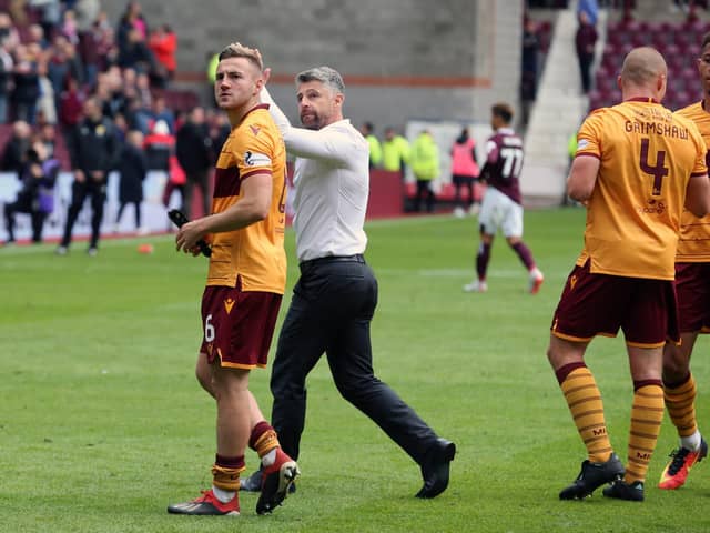 Robinson and Campbell celebrate a 3-2 win at Hearts last season. (Pic by Ian McFadyen)