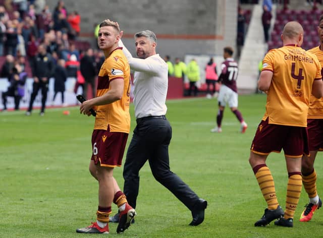 Robinson and Campbell celebrate a 3-2 win at Hearts last season. (Pic by Ian McFadyen)