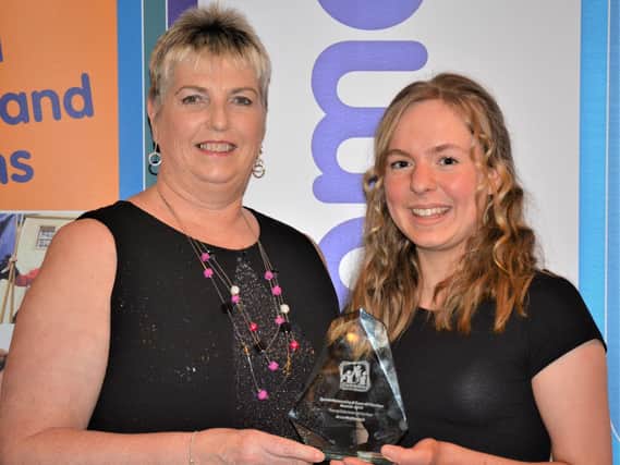 Biggar lass Anna McDiarmid (right) won the Young Volunteer award at this years Clydesdale Sports Personality of the Year Awards.