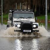 Heavy rain could cause flooding and difficult driving conditions.