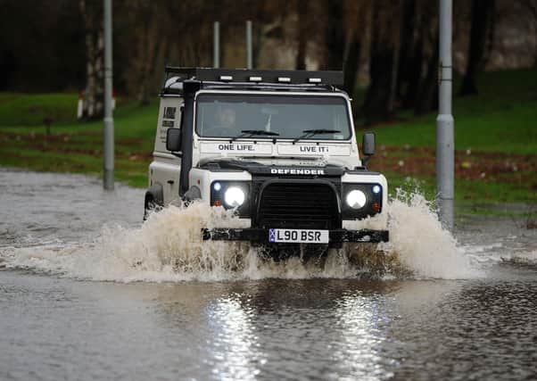 Heavy rain could cause flooding and difficult driving conditions.