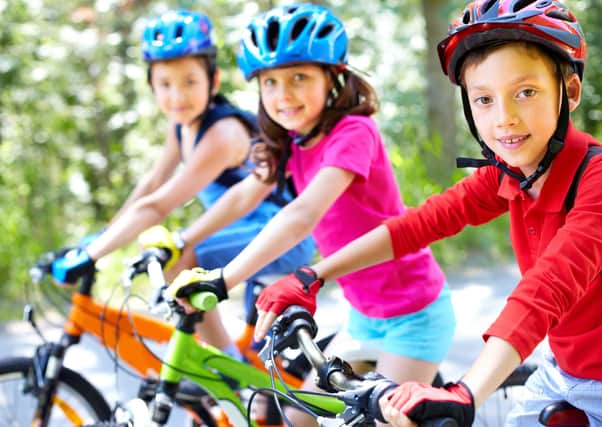 Helmets can reduce the severity of a head injury in the event of an accident.