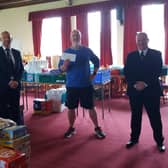 David Dempster (left), of Lodge Newton Mearns, and Stephen Hardy, of Lodge Nitshill, presented the donation to Pastor David Murray.