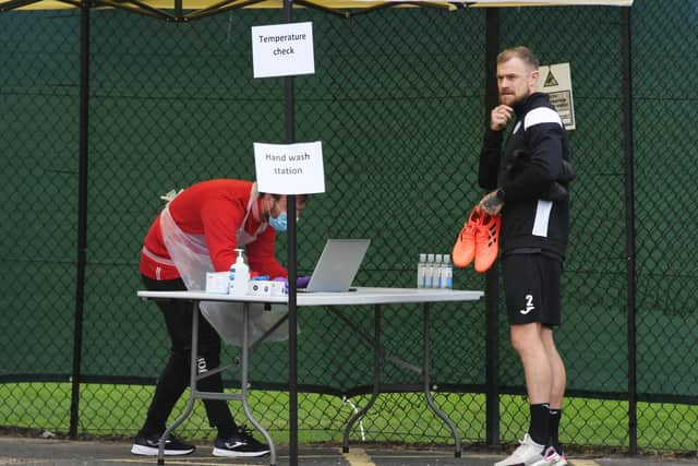 St Mirren’s  Richard Tait gets tested on his return to training.  Iain McMeneny hopes that strict regulations for football will be relaxed. Picture: SNS.