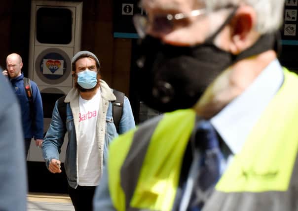 Face coverings are compulsory and to be worn on all public transport
. Photo: Lisa Ferguson