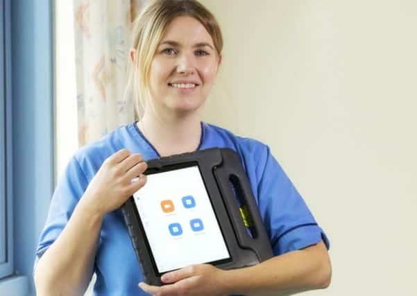 Lara Mitchell says patients' faces light up when they see their family and friends.