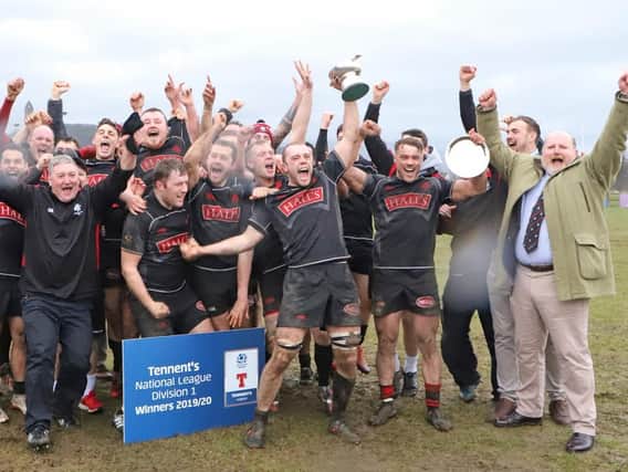 Biggar Rugby Club celebrate winning the 2019-20 National Division 1 two games early back in March. The triumph was subsequently rescinded but an upcoming SGM to appeal this decision will likely be attended by Biggar RFC president Johnny Bogle (pictured 1st right)