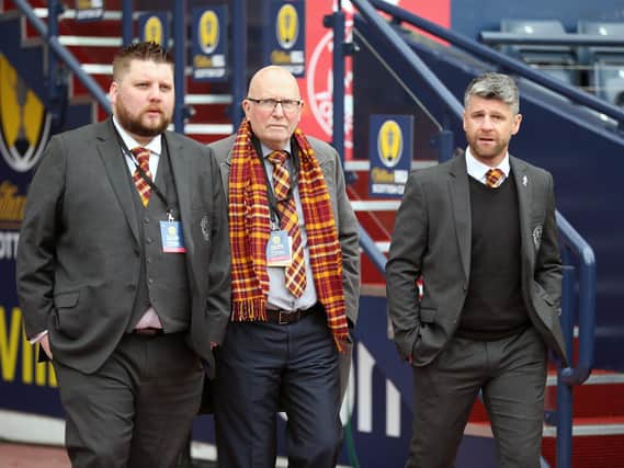 Alan Burrows (1st left) with Motherwell FC chairman Jim McMahon (centre) and manager Stephen Robinson. (Pic by Ian McFadyen)