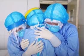 A poignant moment from Paul Martin's music video in aid of the NHS