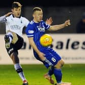 Peterhead captain Scott Brown in action against Falkirk