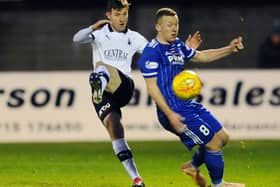 Peterhead captain Scott Brown in action against Falkirk