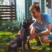 Dogs Trust foster carer Alistair with Terrier cross Annie. Photo: Alistair Horne