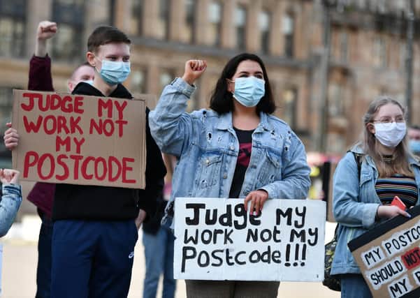 Young people in Glasgow protest over the marking down of their grades by the SQA.