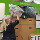 Barnardo's Scotland retail teams working through the many new donations.