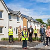Representatives from Barrhead Housing Association and Taylor Wimpey in Neilston  for the hand over of the property.
 
Pictures Copyright: Iain McLean
.