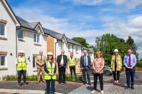 Representatives from Barrhead Housing Association and Taylor Wimpey in Neilston  for the hand over of the property.
 
Pictures Copyright: Iain McLean
.