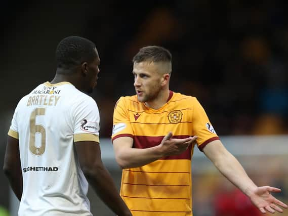 Motherwell's Liam Polworth and Livingston's Marvin Bartley (Pic by Ian McFadyen)