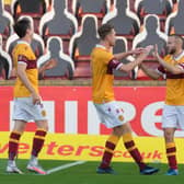 Allan Campbell (right) takes the congratulations of Jordan White after putting Motherwell 2-1 up against Livingston (Pic courtesy of Ian McFadyen)