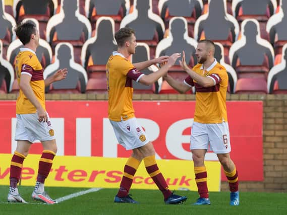 Allan Campbell (right) takes the congratulations of Jordan White after putting Motherwell 2-1 up against Livingston (Pic courtesy of Ian McFadyen)