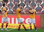 Allan Campbell (right) takes the congratulations of Jordan White after putting Motherwell 2-1 up against Livingston (Pic courtesy of Ian McFadyen)