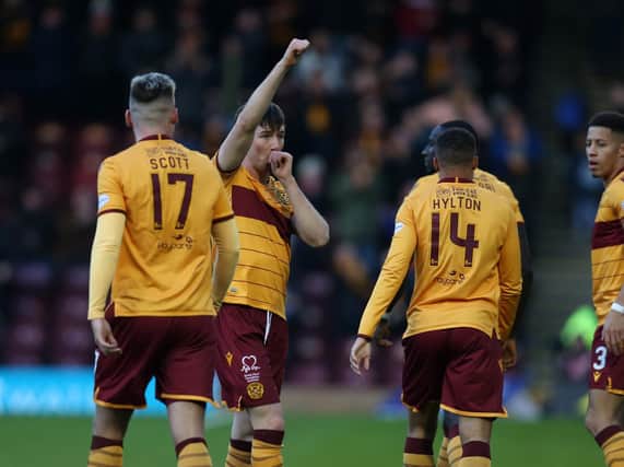 Motherwell striker Chris Long celebrates after scoring his side's goal in a 2-1 home defeat by Hamilton on December 29 last year, the sides' last Scottish Premiership meeting at Fir Park (Pic by Ian McFadyen)