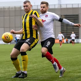 David Goodwillie in action against Dumbarton in Clyde's last match before lockdown