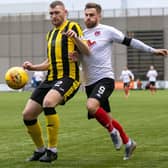 David Goodwillie in action against Dumbarton in Clyde's last match before lockdown